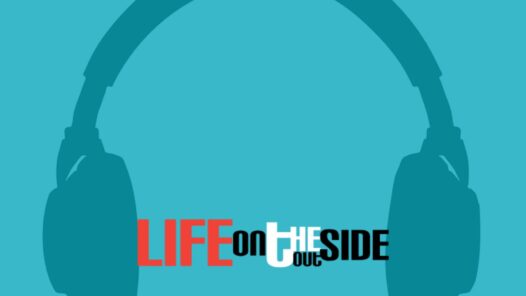 graphic of headphones with Life On The Outside written on it.